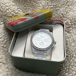 White ceramic fossil watch with original box.